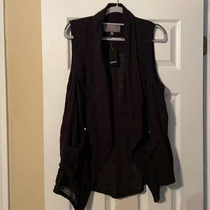 A black torrid vest